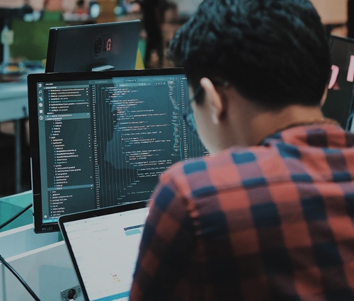 A developer working on a computer